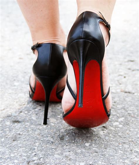 red soled high heels designer.